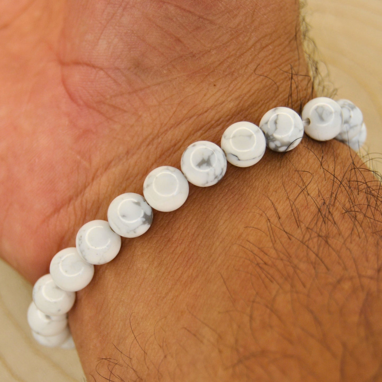 Howlite Bracelet with Crown Charm & Red Gemstone – Elegant Healing Jewelry