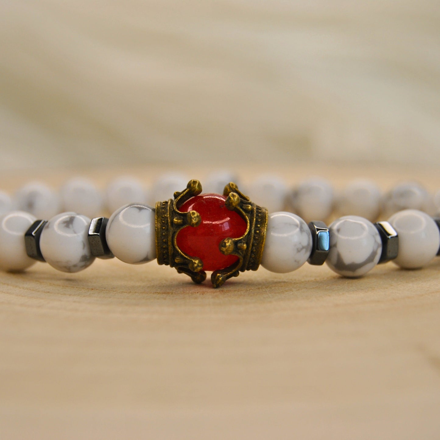 Howlite Bracelet with Crown Charm & Red Gemstone – Elegant Healing Jewelry